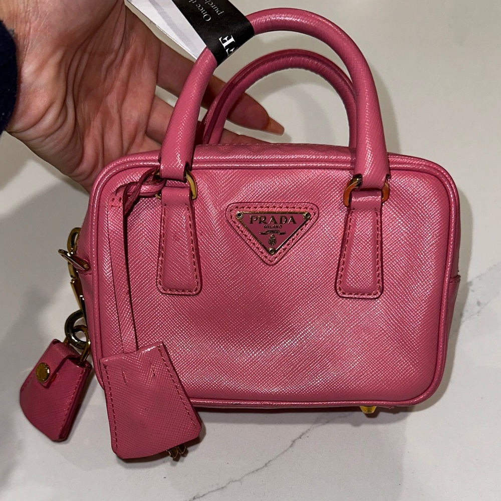 Prada
Mini Saffiano Lux Handle Bag
